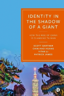 Identity in the Shadow of a Giant - Scott Gartner, Chin-Hao Huang, Yitan Li, Patrick James