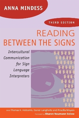Reading Between the Signs - Anna Mindess