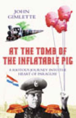 At The Tomb Of The Inflatable Pig - John Gimlette